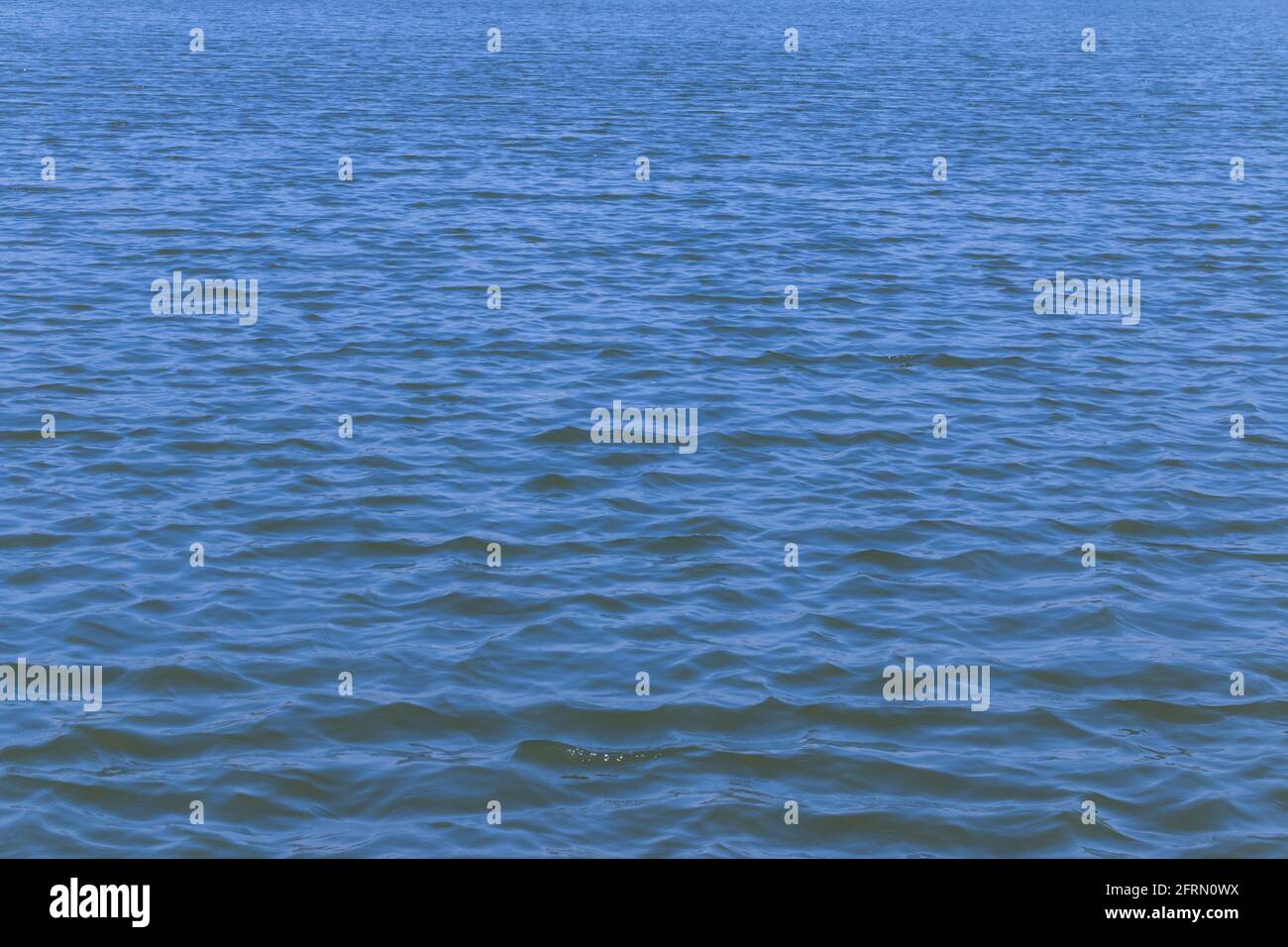 blue water with waving surface background Stock Photo - Alamy