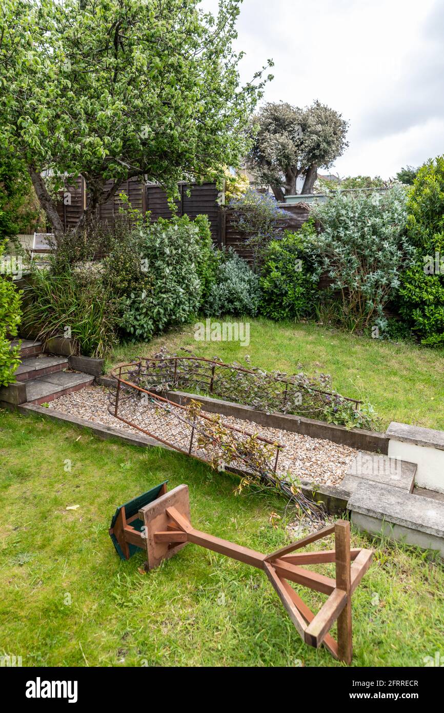 Poole, UK. Friday 21 May 2021. Damage to garden furniture and fences in Dorset. Credit: Thomas Faull/Alamy Live News Stock Photo