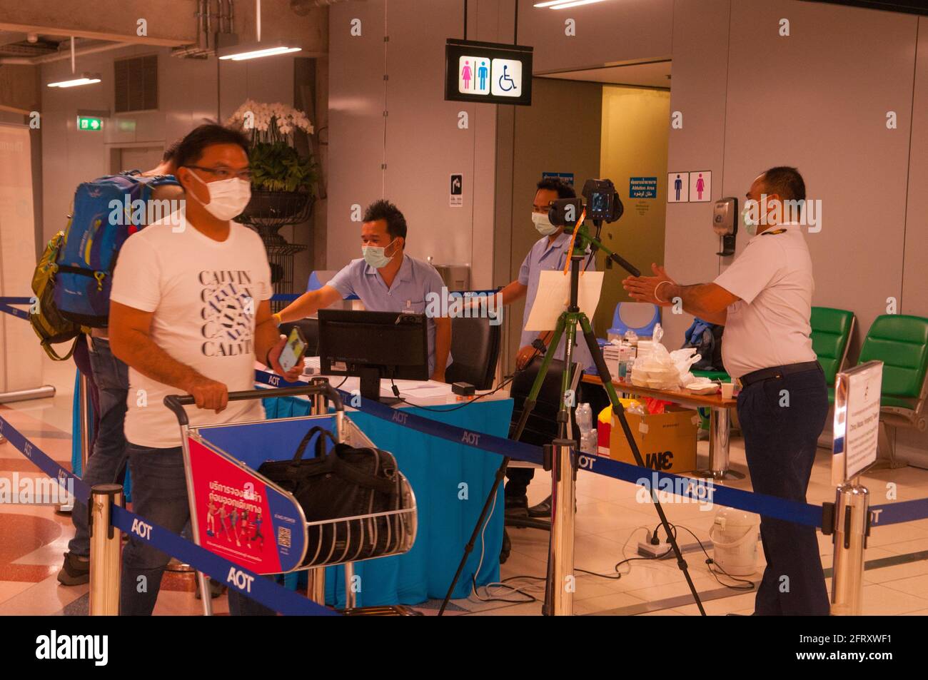 Airport security employees check passengers hires stock photography