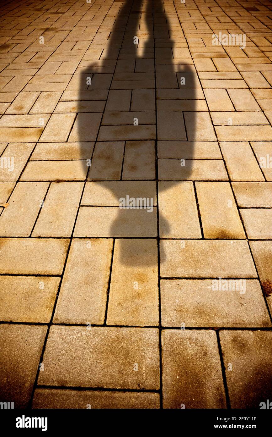 shadow of a man wearing a top hat Stock Photo - Alamy