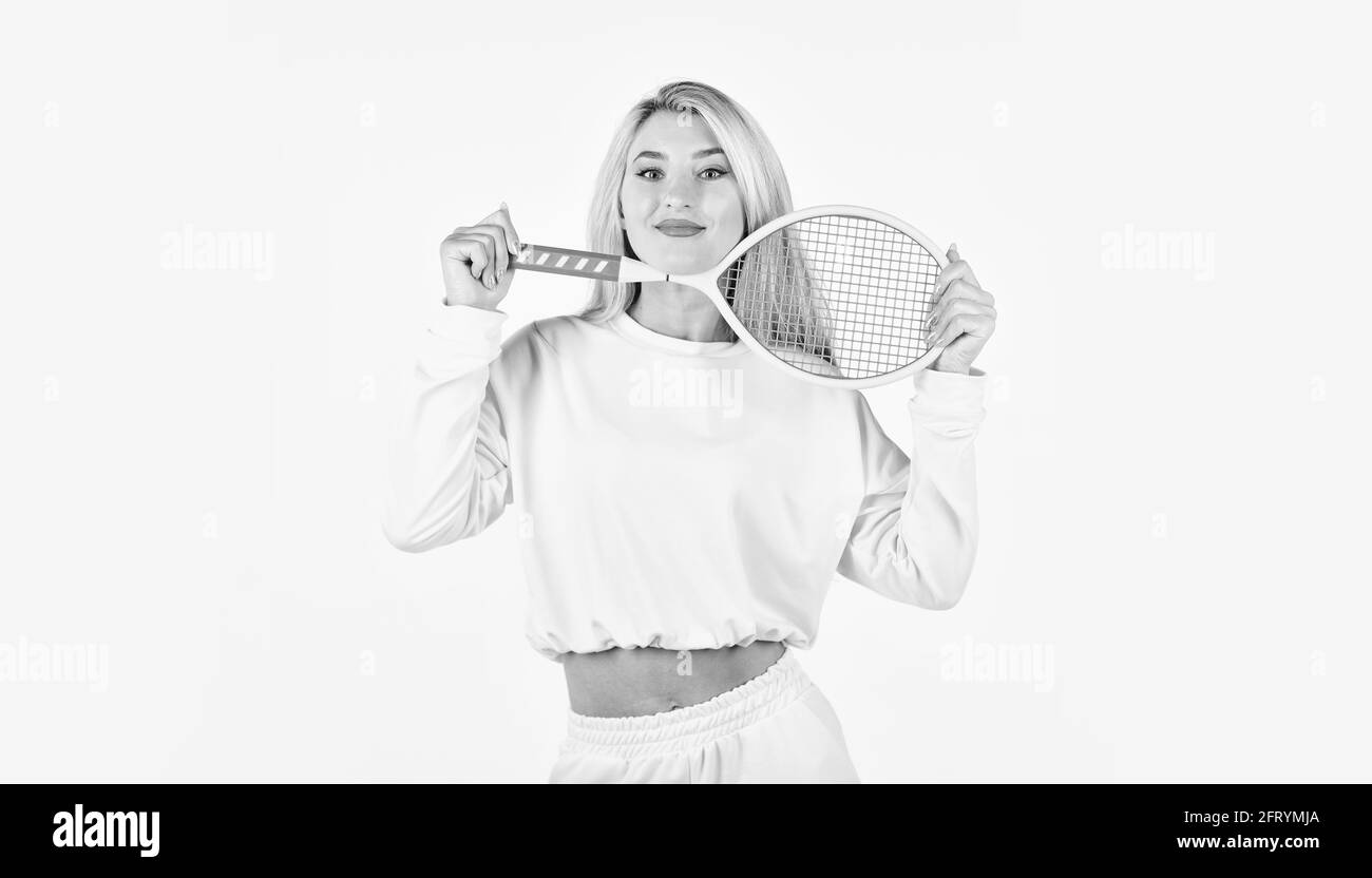 Summer activity. Sport for health. Girl hold tennis racket in hand. Fitness woman. Play game. Tennis club concept. Active leisure and hobby. Tennis Stock Photo