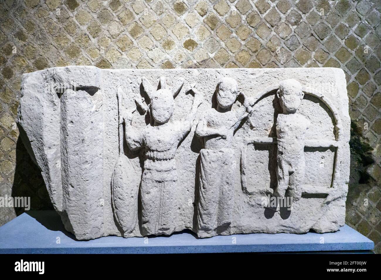 Architectural element (metope) depicting the torment of Isson End of 4th cent.-beginning of 3rd cent. BC Tufa Doric temple Pompeii archaeological site, Italy Stock Photo