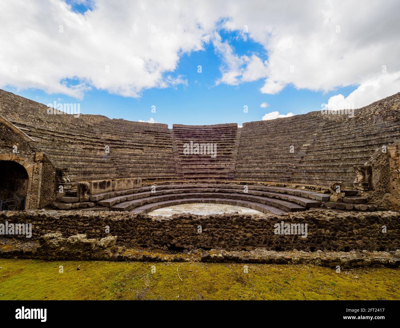 The Odeon or theatrum tectum as it was called by the Romans. This building was dedicated to the representation of the most popular theatrical genre at the time, miming, and could also be used for musical and singing performances - Pompeii archaeological site, Italy Stock Photo