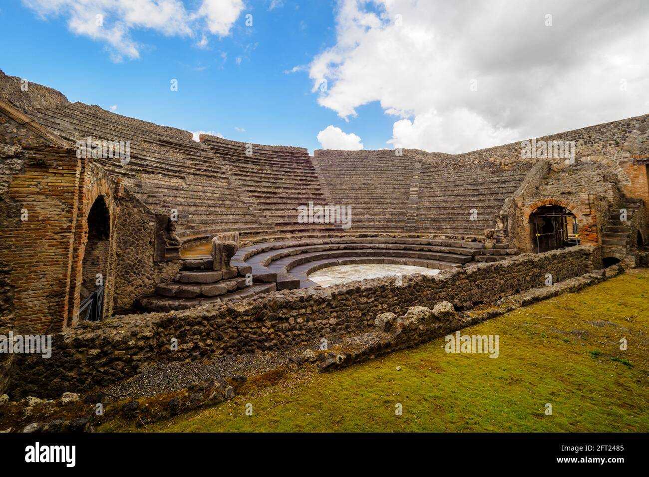 The Odeon or teatrum tectum as it was called by the Romans. This building was dedicated to the representation of the most popular theatrical genre at the time, miming, and could also be used for musical and singing performances - Pompeii archaeological site, Italy Stock Photo