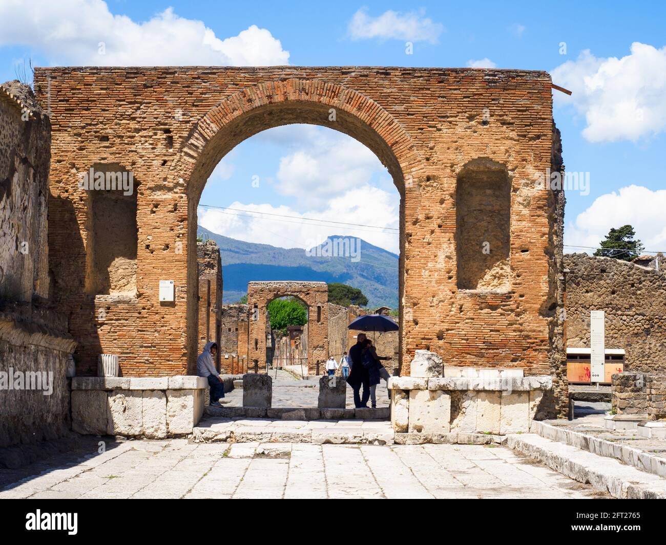 Honorary arch of Tiberius in the forum - Pompeii archaeological site, Italy Stock Photo