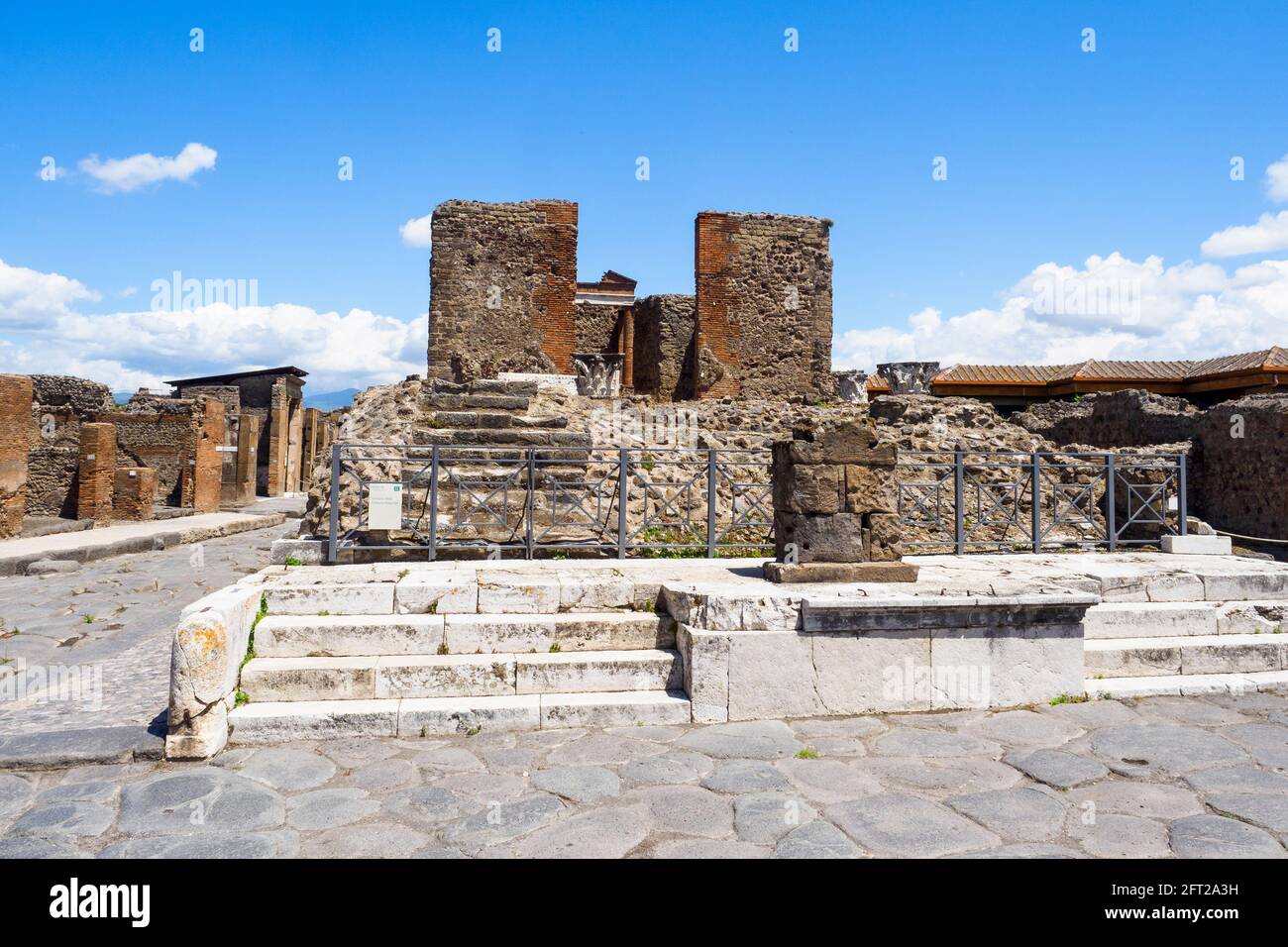 The Temple of Fortuna Augusta lies at the corner of Via del Foro and Via della Fortuna - Pompeii archaeological site, Italy Stock Photo