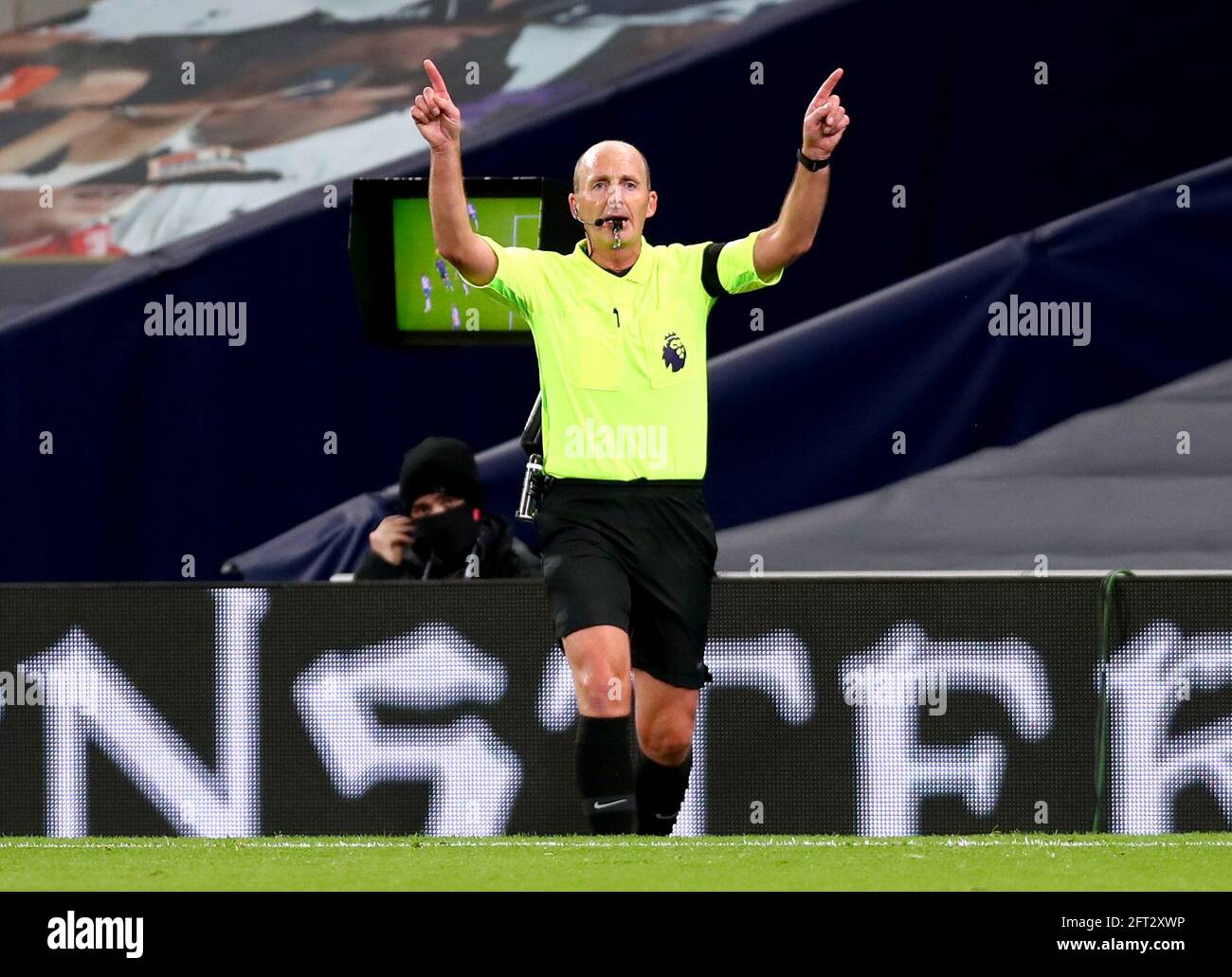 File photo dated 21-11-2020 of Referee Mike Dean disallows a goal scored by Manchester City's Aymeric Laporte after consulting VAR during the Premier League match at the Tottenham Hotspur Stadium, London. Issue date: Friday May 21, 2021. Stock Photo