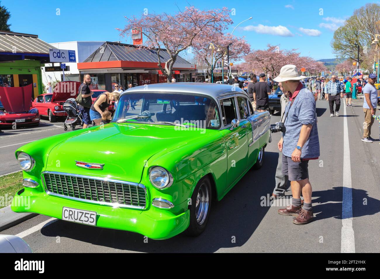 A 1955 Chevrolet 150 with vivid green paint at a classic car show. Tauranga, New Zealand Stock Photo