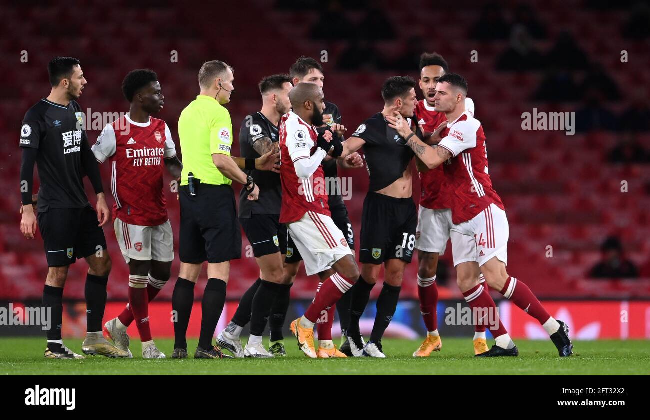 File photo dated 13-12-2020 of Arsenal's Granit Xhaka (far right) grabs Burnley's Ashley Westwood (18) round the throat which results in a red card for Xhaka following a VAR review during the Premier League match at Emirates Stadium, London. Issue date: Friday May 21, 2021. Stock Photo