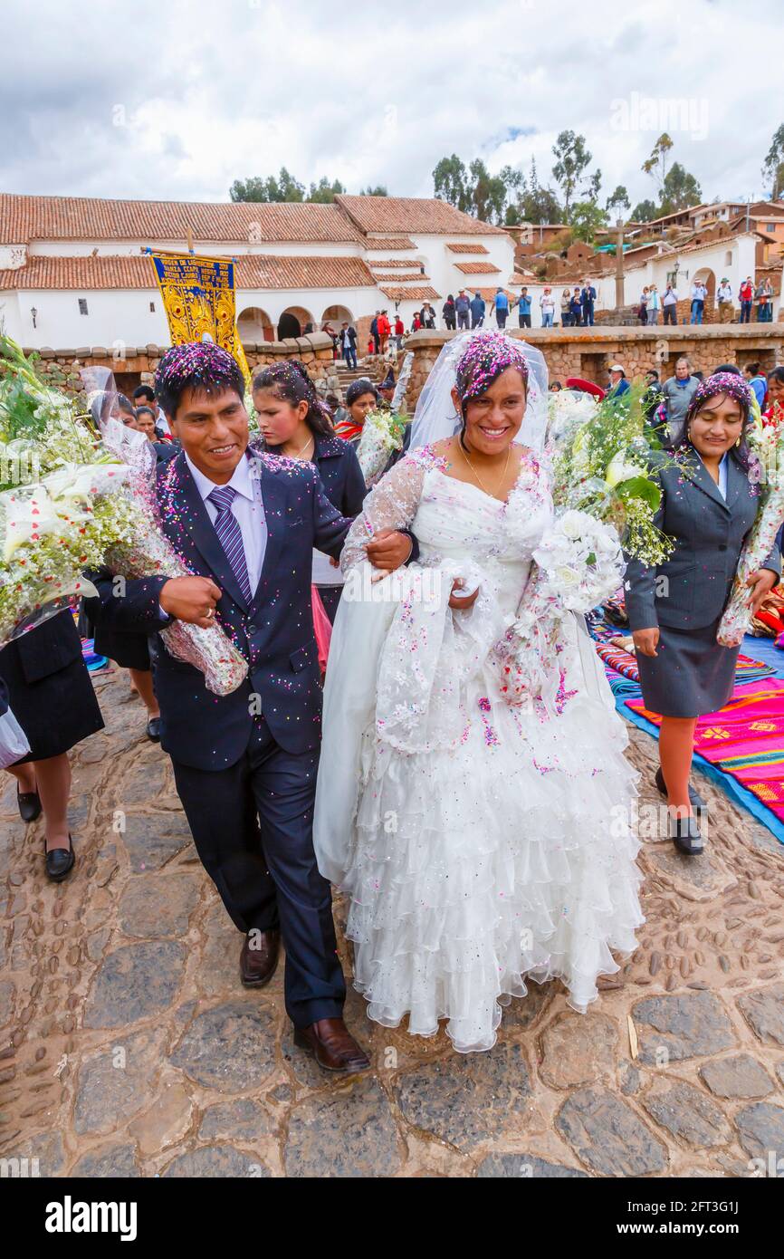 Smiling Quechua bride and groom at a traditional local wedding, Chinchero, a rustic Andean village in the Sacred Valley, Urubamba, Cusco Region, Peru Stock Photo