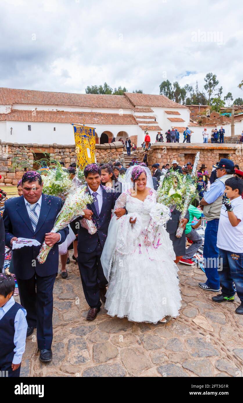Smiling bride and groom at a traditional local wedding, Chinchero, a rustic Andean village in the Sacred Valley, Urubamba Province, Cusco Region, Peru Stock Photo