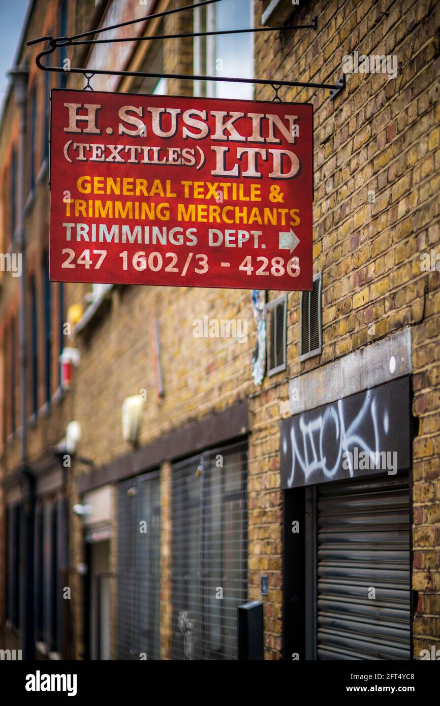 Vintage Sign in Spitalfields East London - H. Suskin Textiles Ltd Stock Photo