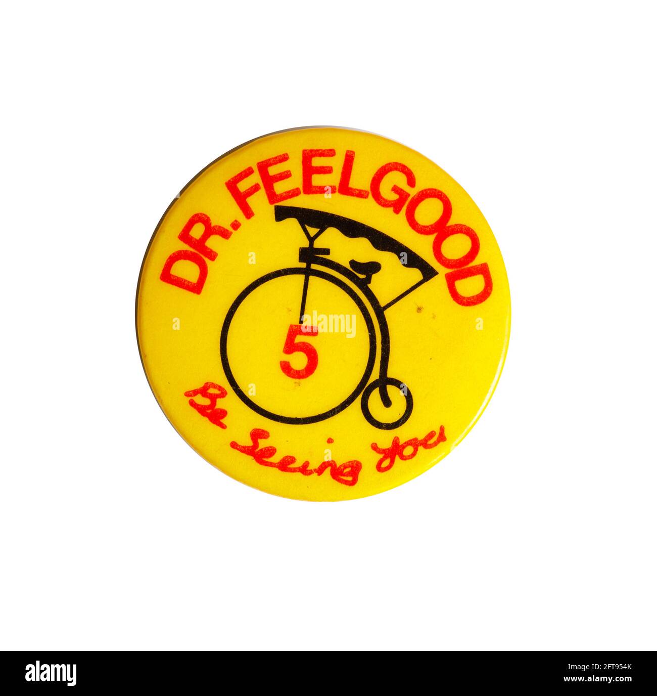 Tour memento pin badge from the Dr Feelgood 1977 'Be seeing you' tour, with number 5. Stock Photo