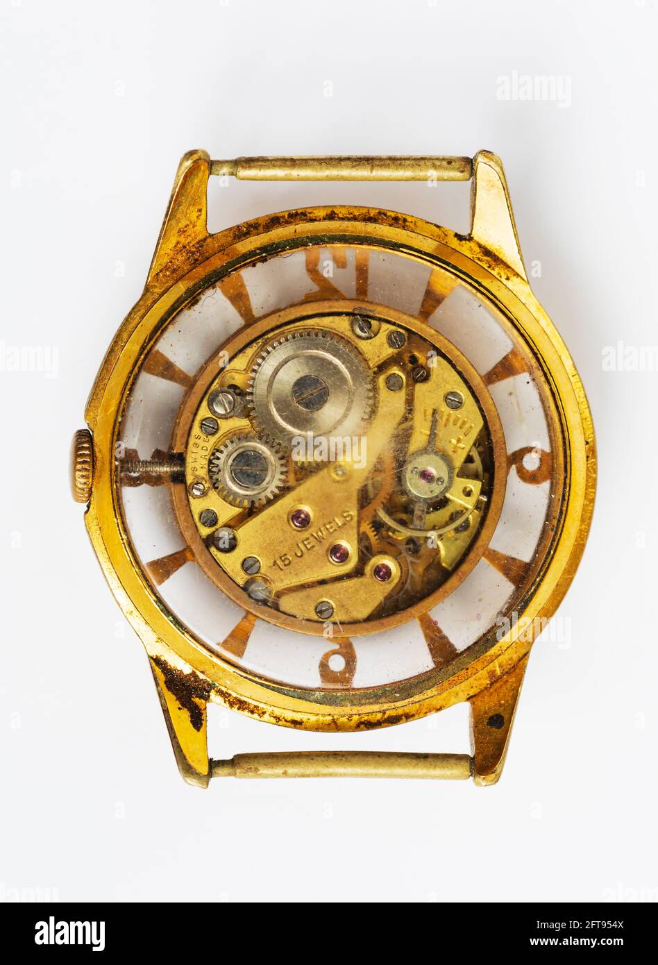 Antique, glass backed wrist watch showing internal movement. Stock Photo