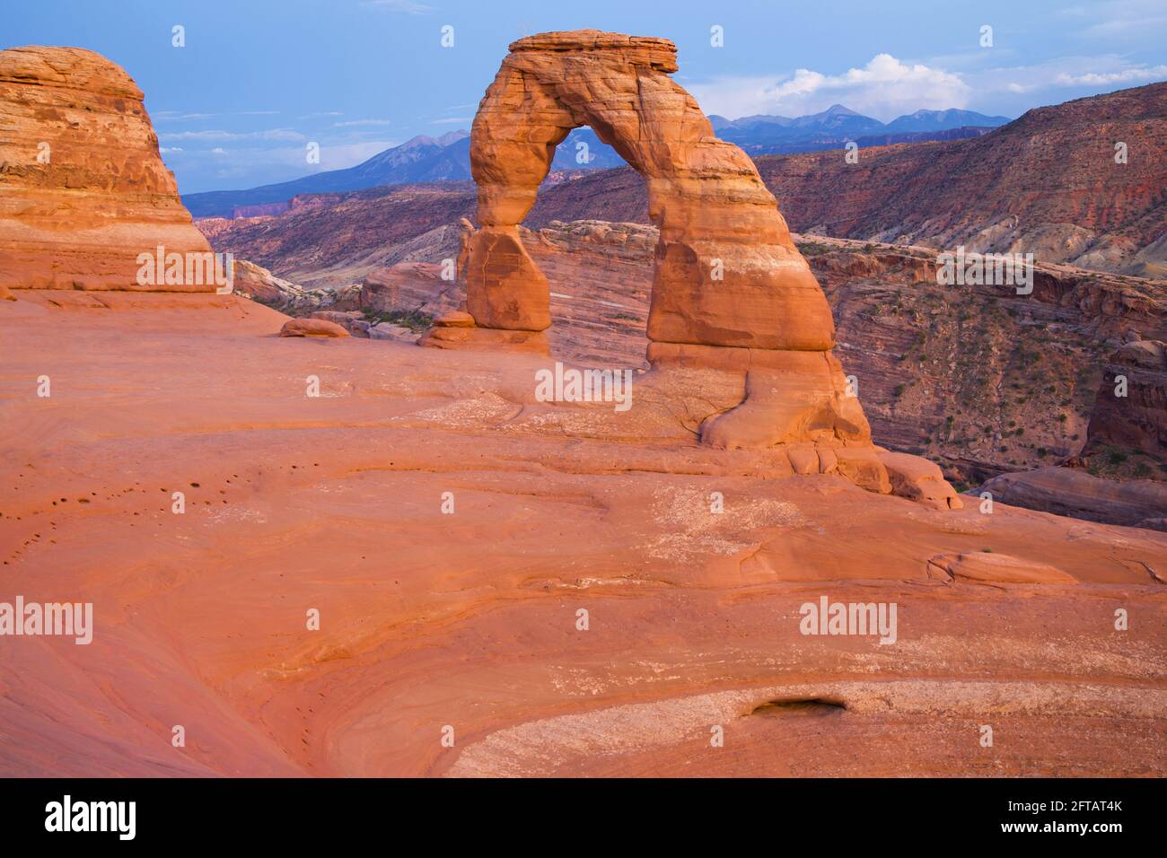 Delicate Arch at dusk, Arches National Park, Utah, USA. Stock Photo