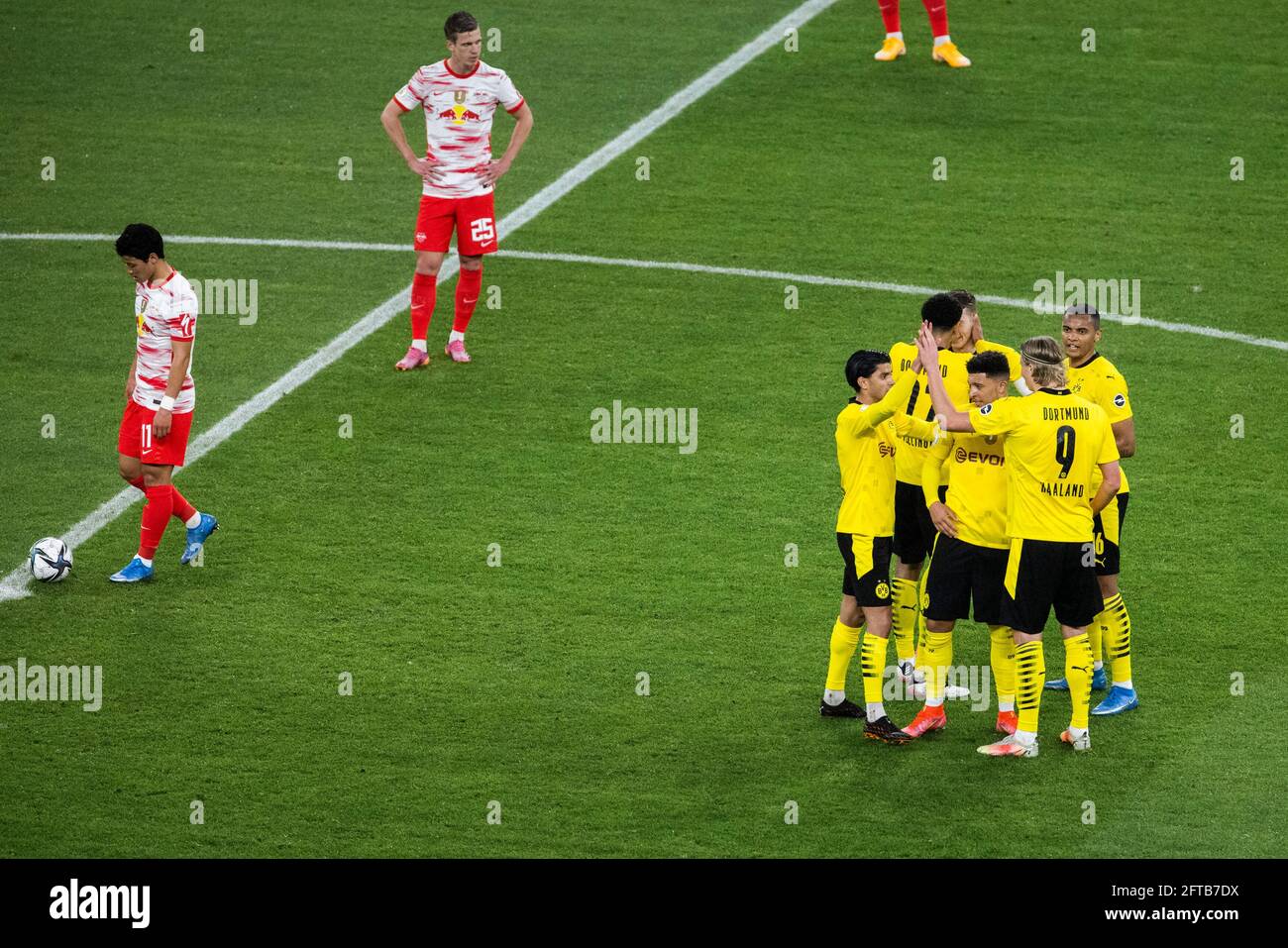 Berlin, Olympiastadion 13.05.21: Team Dortmund with Erling Haaland (BVB) (9) and Marco Reus (BVB) while player of Leipzig are disappointed celebrate a Stock Photo