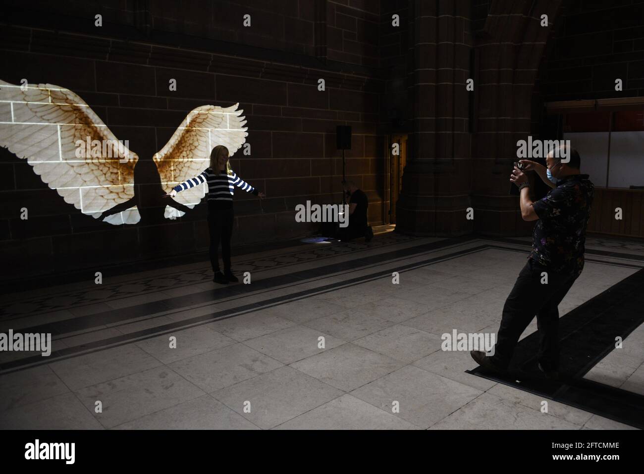 Angel Wings moving light projection, created by Luxmuralis. On display at the Anglican Cathedral, Liverpool from 21 May until 31 August 2021. Stock Photo