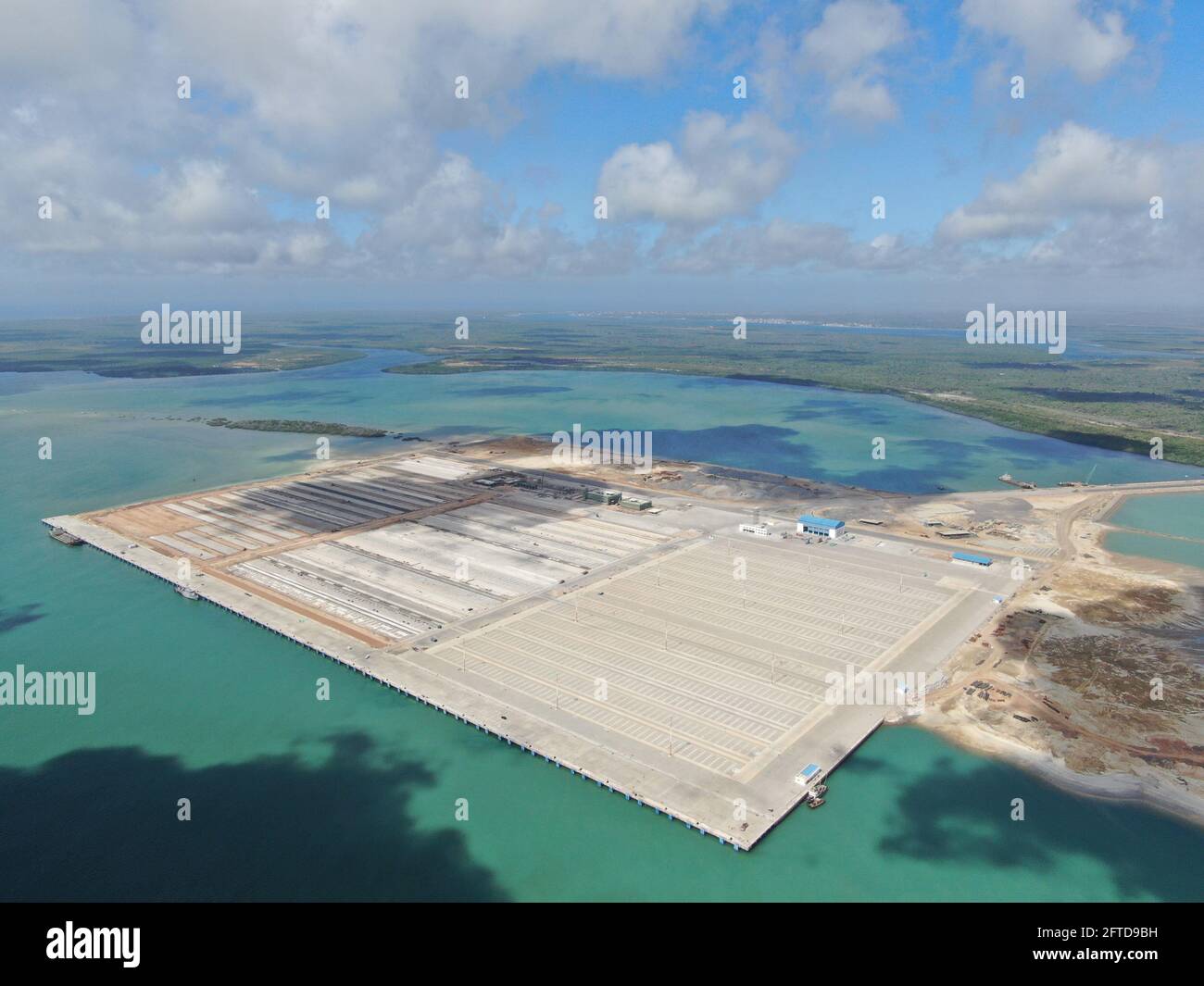 Lamu. 16th May, 2021. Aerial photo taken on May 16, 2021 shows an overview  of the first berth of Lamu Port in Kenya. Lamu Port, which is being built  by China Communications