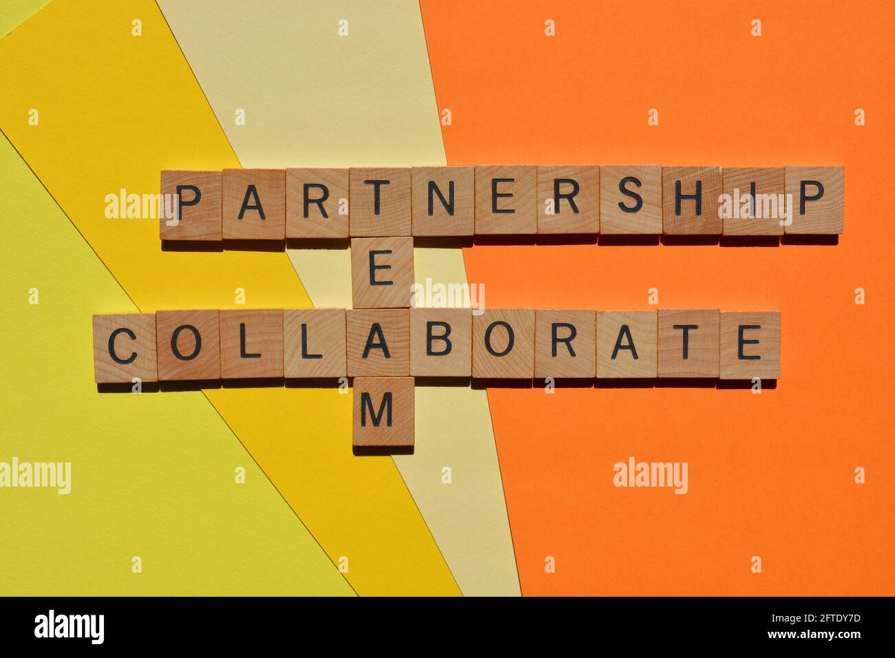 Partnership, Team, Collaborate, words in wooden alphabet letters in crossword form Stock Photo