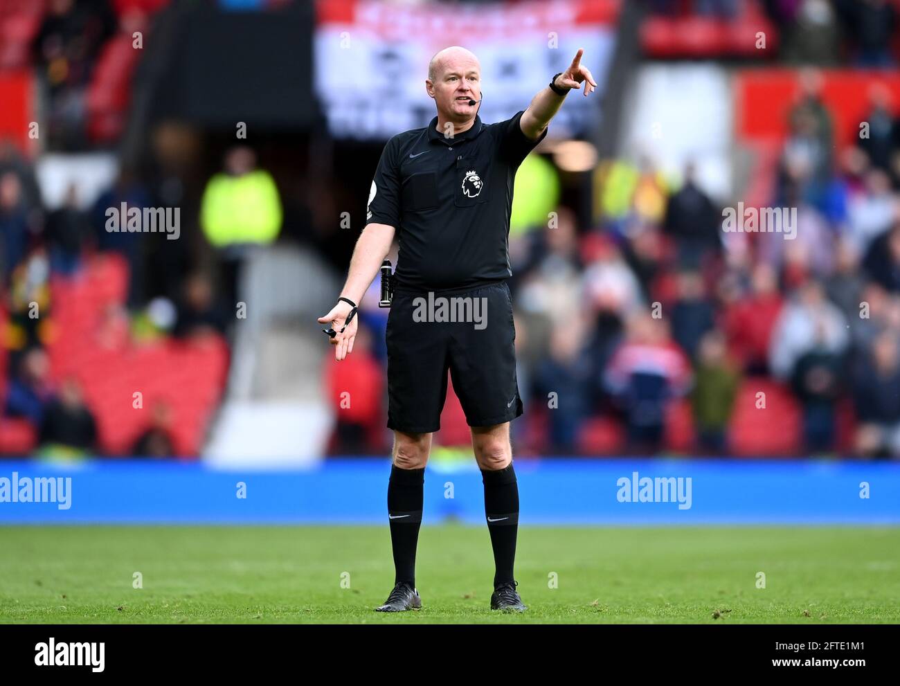 Referee Lee Mason during the Premier League match at Old Trafford, Manchester. Picture date: Tuesday May 18, 2021. Stock Photo