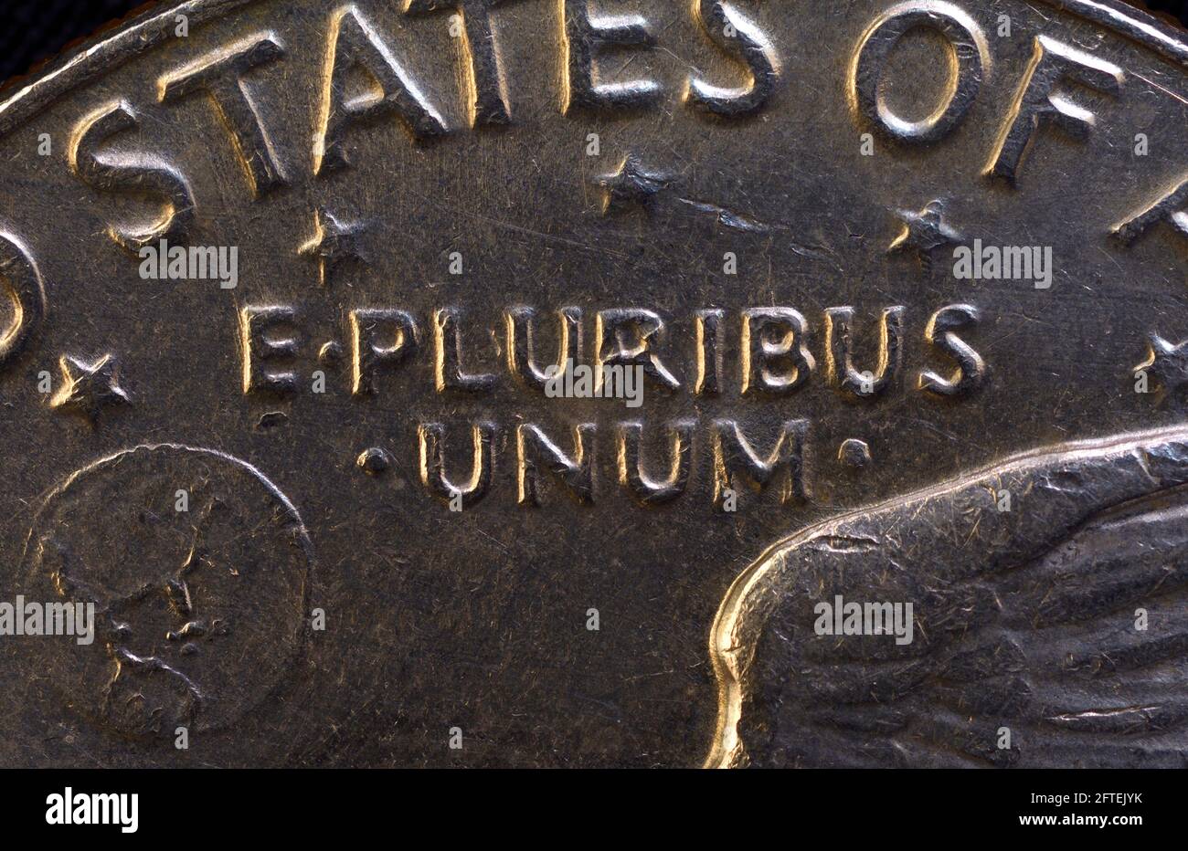 Lettering E Pluribus Unum, one out of many, on the reverse