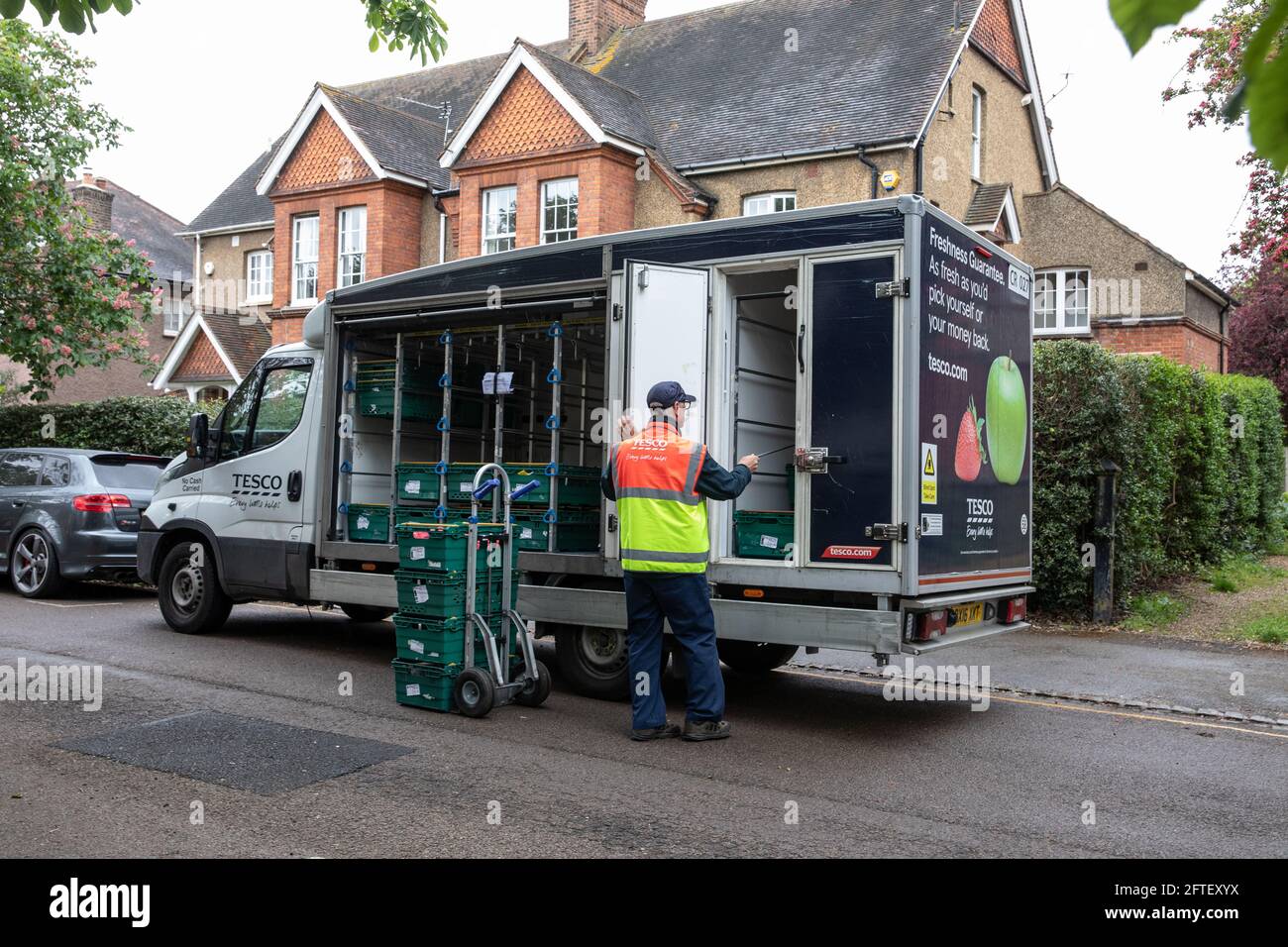 Tesco delivery van on a residential street in Southwest London, England, United Kingdom Stock Photo