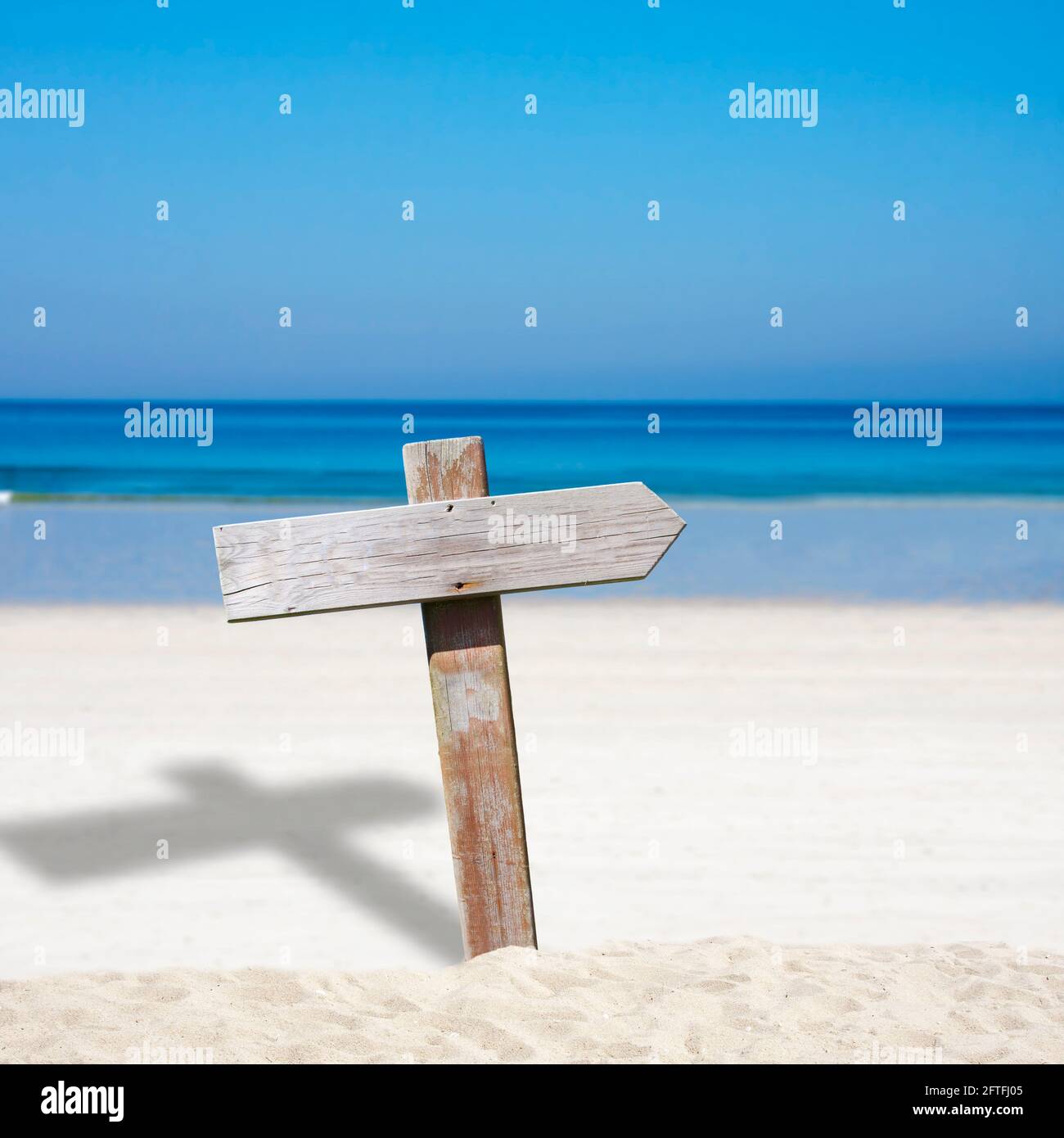 wooden sign on the beach Stock Photo