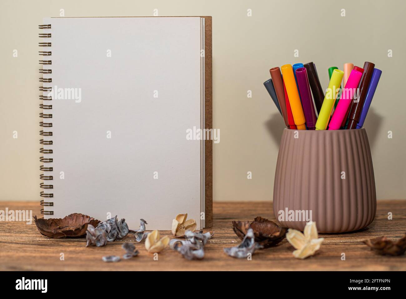 Creative workshop for kids. Sharp coloured drawing pencils, markers on  table. Embroidery fabric with hand embroidered colorful elements. Kids  learning Stock Photo - Alamy