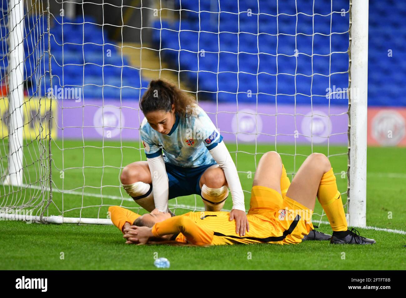 Cardiff, Wales. 27 October, 2020. Ingrid Moe Wold of Norway Women consoles goalkeeper Cecilie Fiskerstrand of Norway Women during the UEFA Women's European Championship 2020 Qualifying Group C match between Wales Women and Norway Women at the Cardiff City Stadium in Cardiff, Wales, UK on 27, October 2020. Credit: Duncan Thomas/Majestic Media. Stock Photo