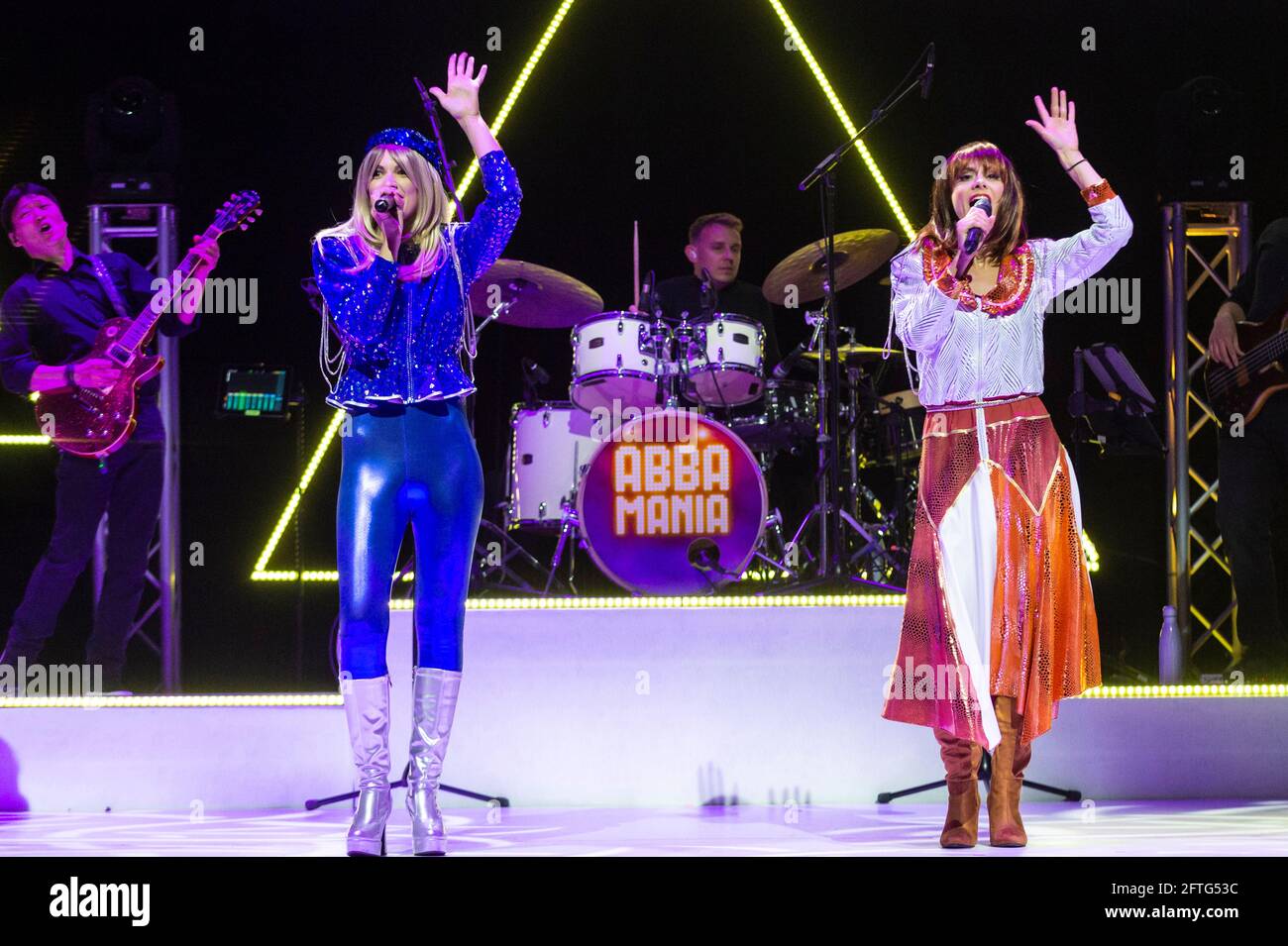 London, UK. 21st May, 2021. The cast of ABBA MANIA perform at a photocall  at the Shaftesbury Theatre as lockdown restrictions are eased slightly and  audiences can return. ABBA MANIA is the