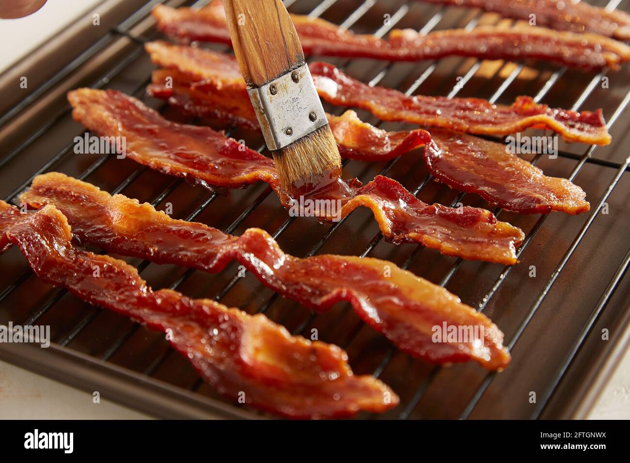 Maple syrup glazed bacon Stock Photo Alamy