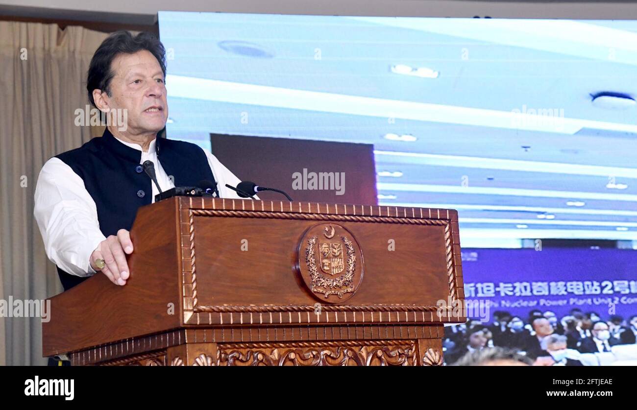 (210521) -- ISLAMABAD, May 21, 2021 (Xinhua) -- Pakistani Prime Minister Imran Khan addresses the inauguration ceremony of the Karachi Nuclear Power Plant Unit-2 (K-2) in Islamabad, capital of Pakistan on May 21, 2021. Speaking virtually at the inauguration ceremony of the Karachi Nuclear Power Plant Unit-2 (K-2), Imran Khan said that Friday marks the 70th anniversary of the establishment of diplomatic relations between the two countries, and apart from the ever-strengthening bilateral ties. Stock Photo