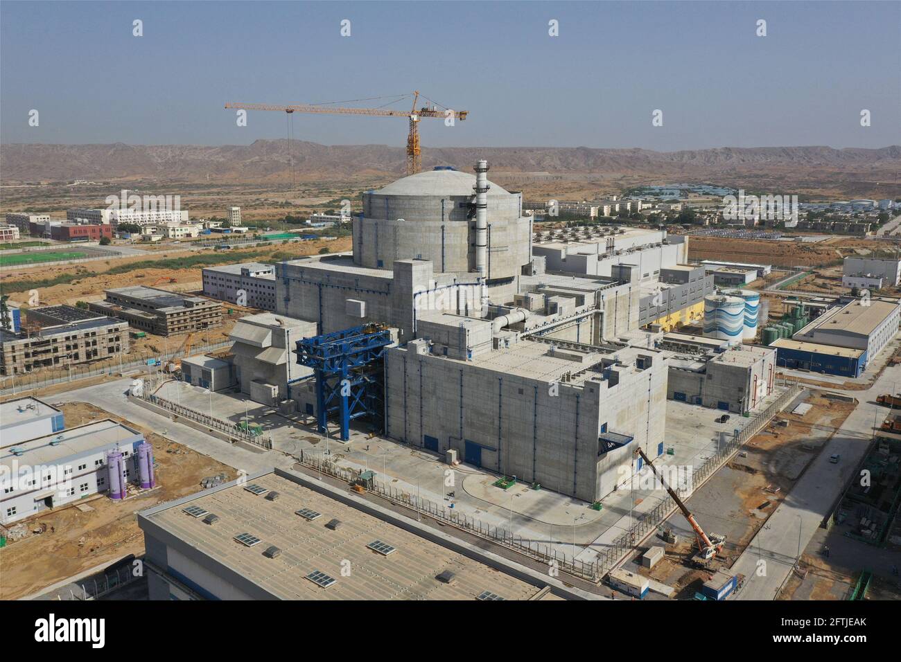 Karachi. 19th May, 2021. Photo taken on May 19, 2021 shows Karachi Nuclear Power Plant Unit-2 (K-2) in southern Pakistani port city of Karachi. Speaking virtually at the inauguration ceremony of the Karachi Nuclear Power Plant Unit-2 (K-2), Pakistani Prime Minister Imran Khan said that Friday marks the 70th anniversary of the establishment of diplomatic relations between the two countries, and apart from the ever-strengthening bilateral ties, the people-to-people contacts have also become deep-rooted with the passage of time. Credit: Str/Xinhua/Alamy Live News Stock Photo