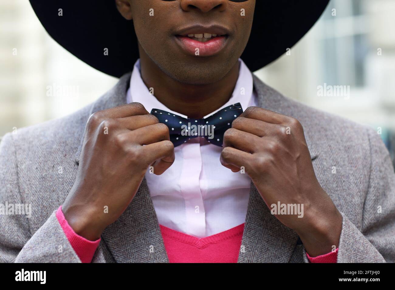 GREAT BRITAIN / England /London /London Fashion Week/ Man is making a bow tie . Stock Photo