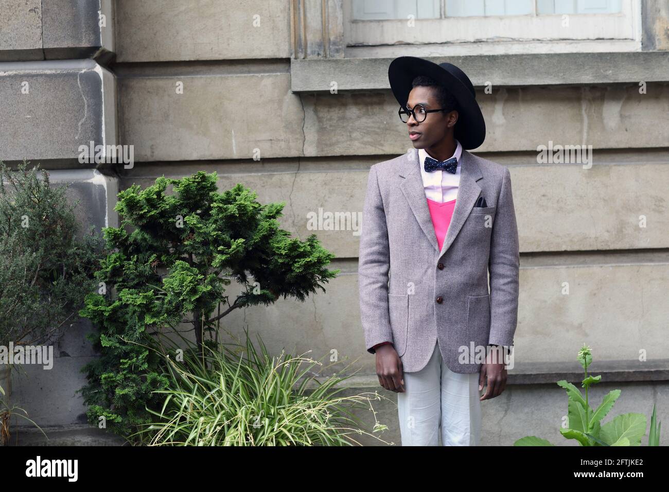 GREAT BRITAIN / England /London /London Fashion Week/Influencer with bow tie Stock Photo