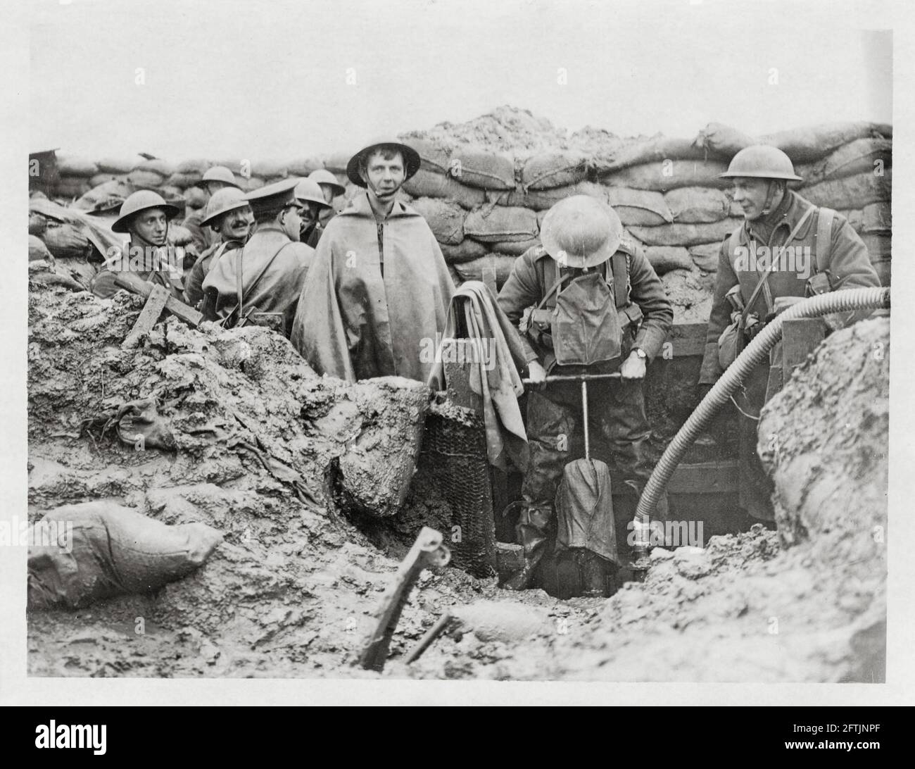 World War One, WWI, Western Front - Men using a pump in a front line trench, France Stock Photo