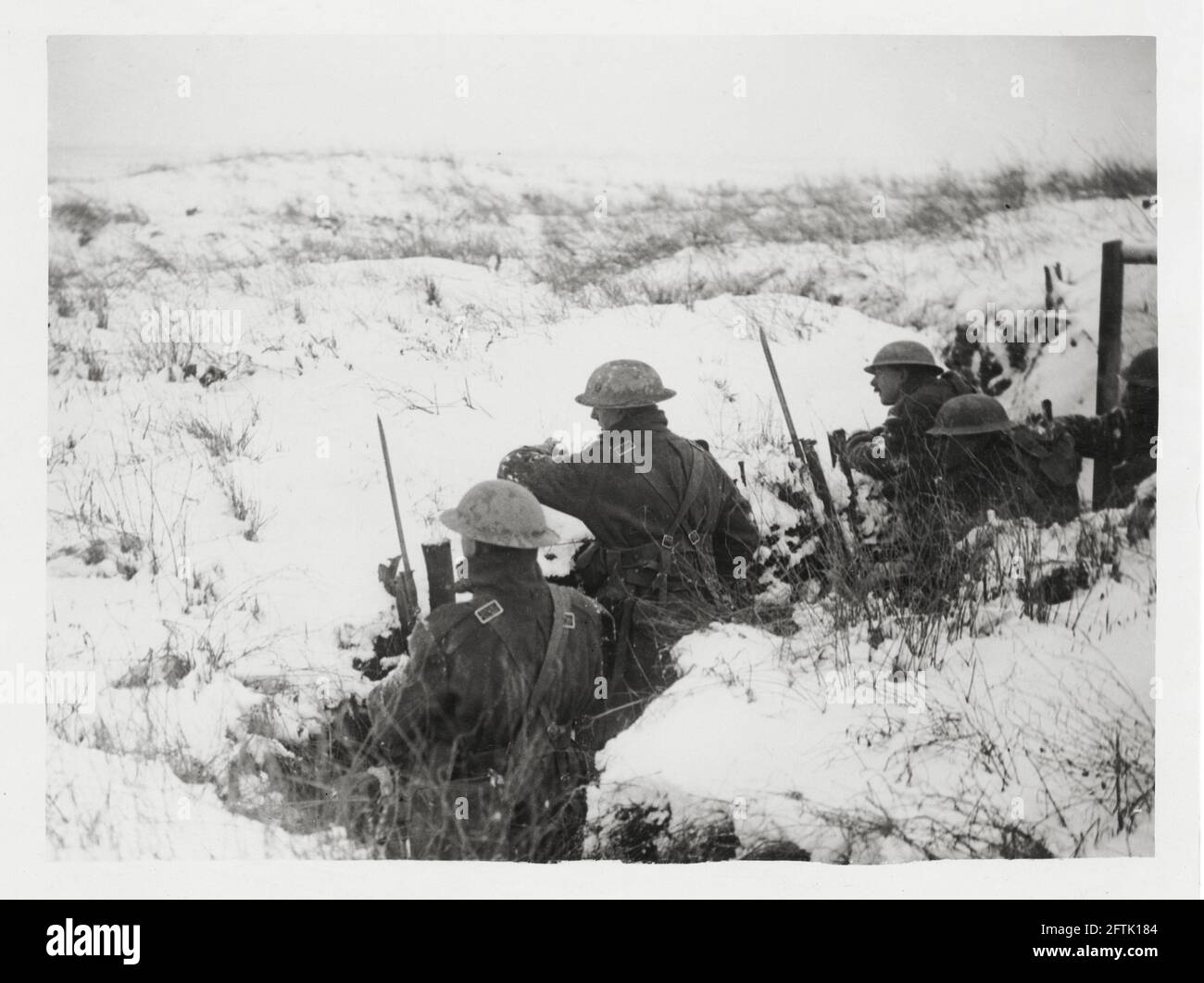 World War One, WWI, Western Front - Scene of the snow-clad front, men in a trench, France Stock Photo