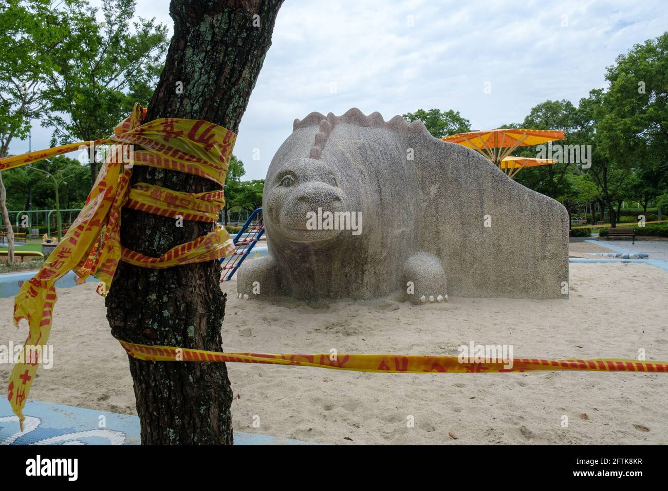 Taipei, Taiwan. 21st May, 2021. Daan Forest Park playground seen being isolated by a security cordon.Taiwan confirmed 315 new cases of COVID-19 after the authorities raised the COVID-19 alert to Level 3 nationwide. Credit: SOPA Images Limited/Alamy Live News Stock Photo