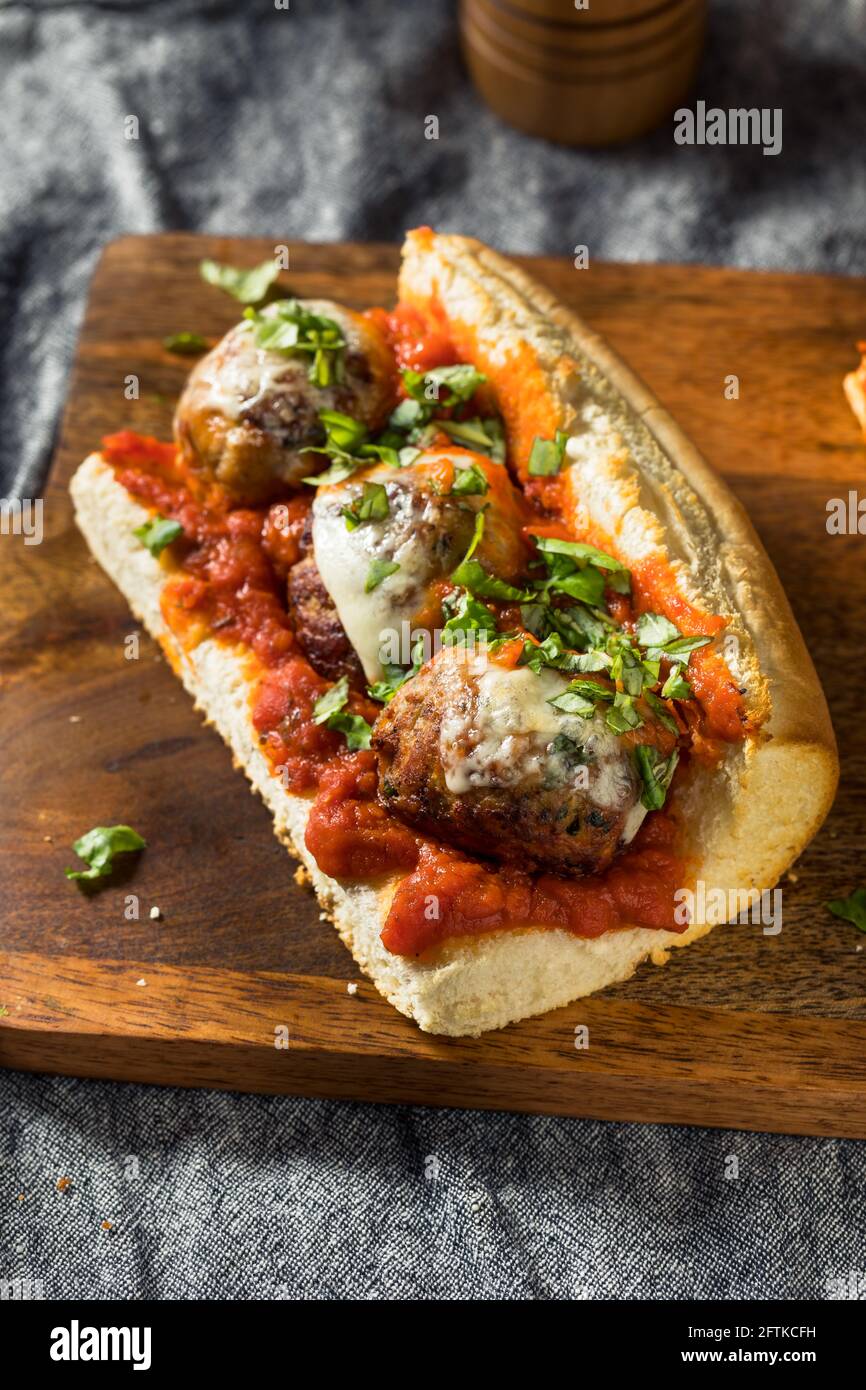 Homemade Cheesy Meatball Sub Sandwich with Marinara and Provolone Stock