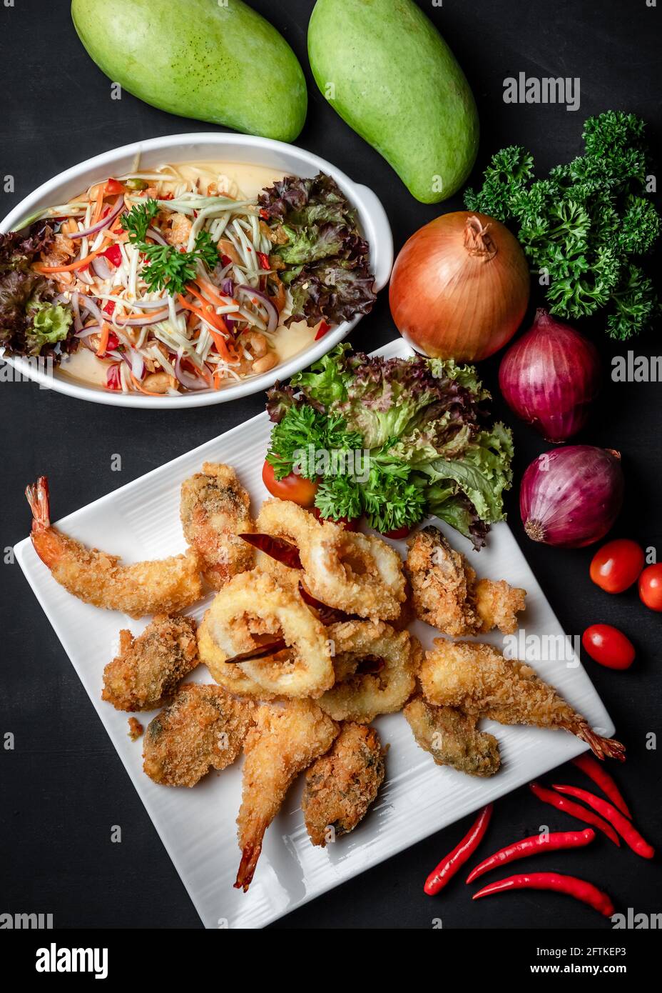 A Dish of Deep Fried Battered Seafood Tempura Sided with Thai Spicy