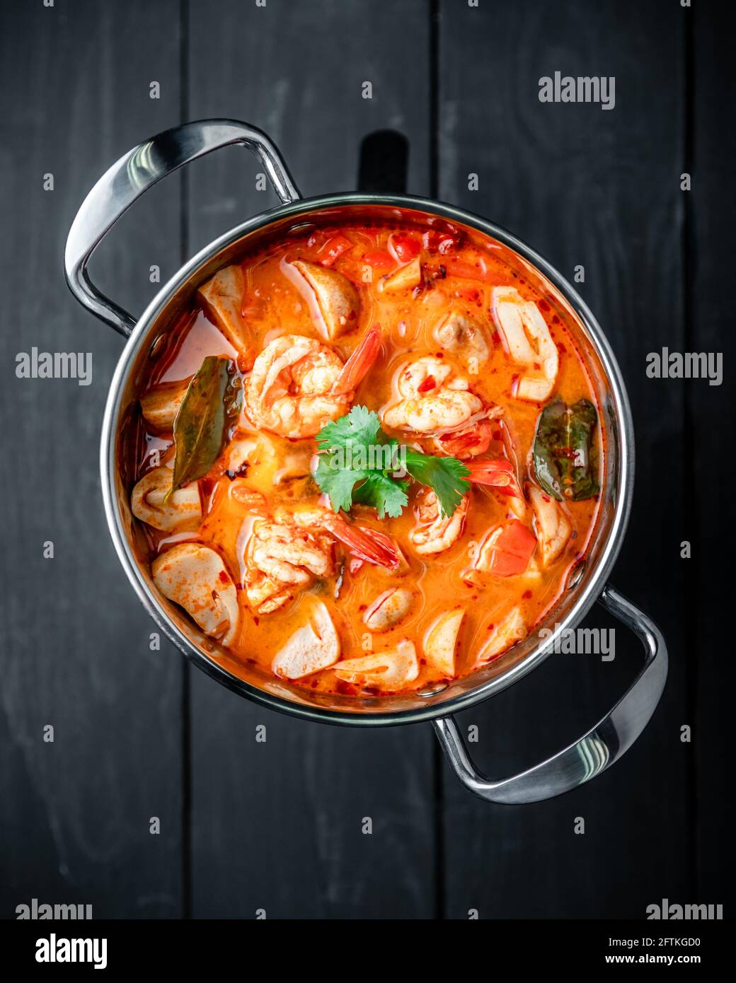 Spicy Thai Tom Yum Goong Soup in Stainless Steel Hot Pot Stock Photo - Alamy