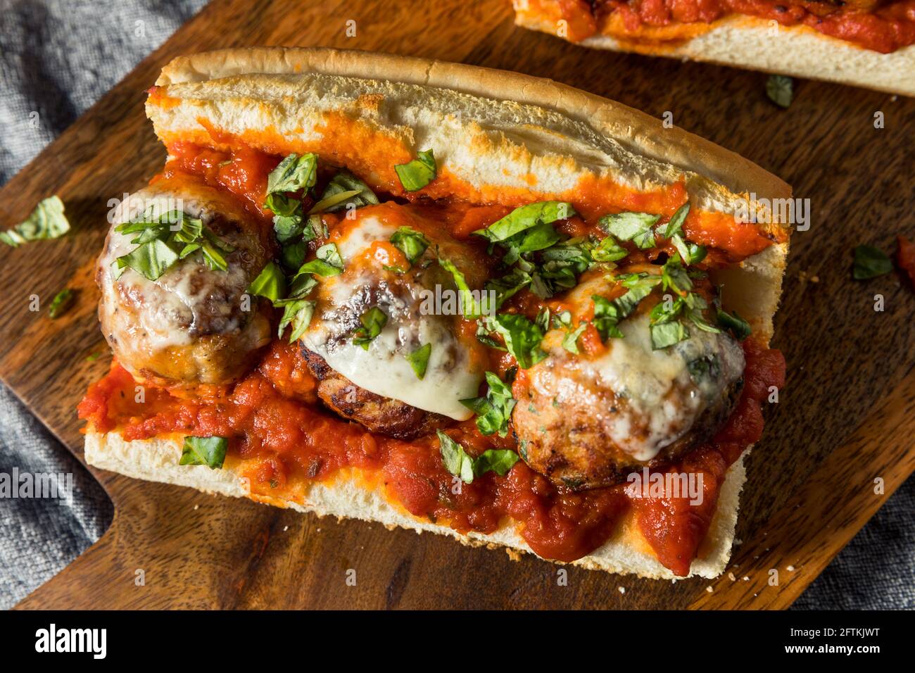 Homemade Cheesy Meatball Sub Sandwich with Marinara and Provolone Stock