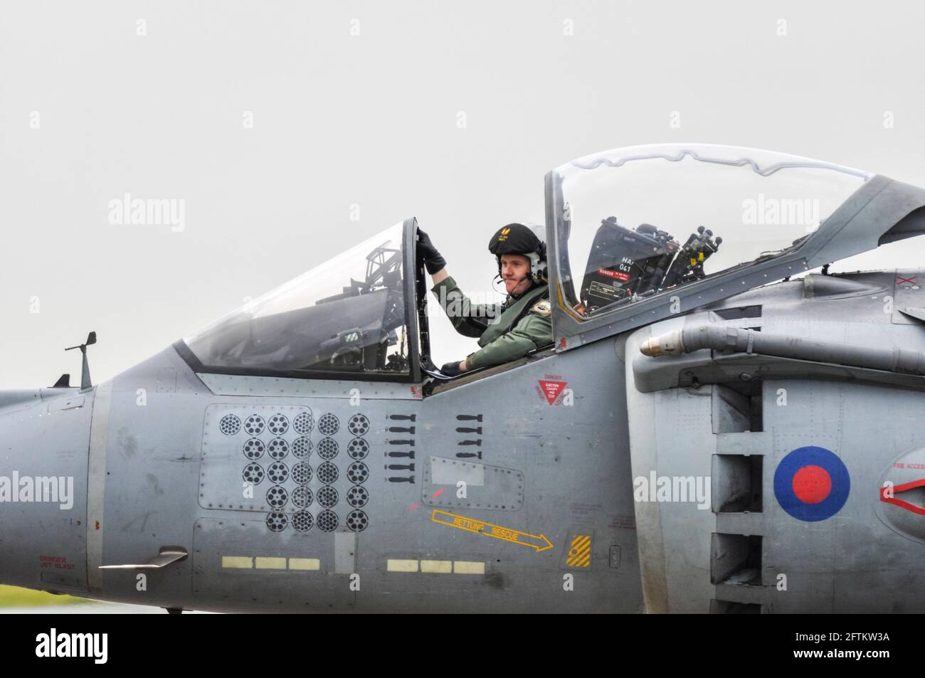 Harrier Farewell. One of the final BAe Harrier II jet fighter planes taxi in after final flights by RAF Harrier jump jets following retirement axe Stock Photo