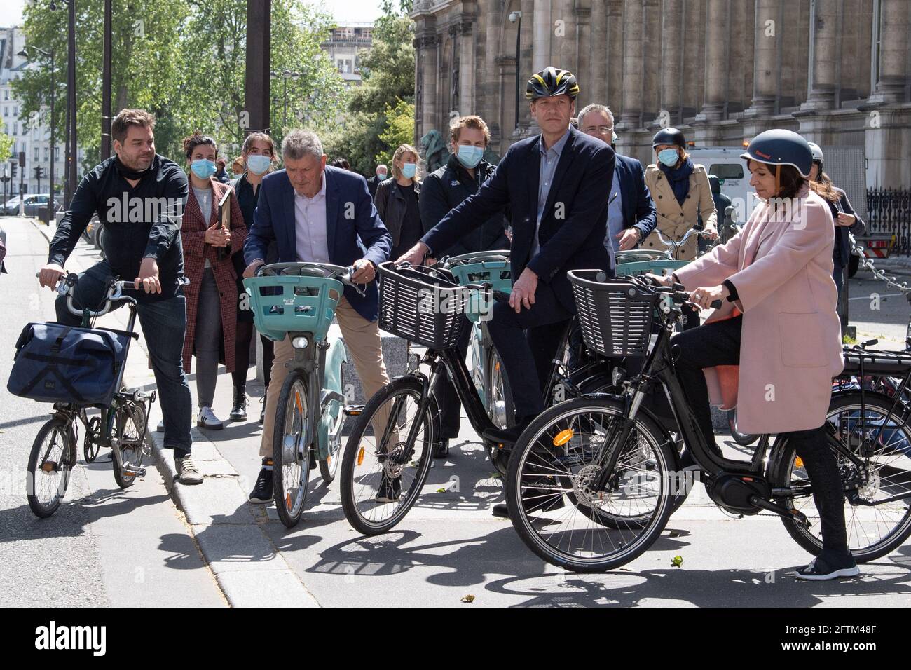 Olivier Schneider, Bernard Thevenet, Christian Prudhomme, Mayor of Paris  Anne Hidalgo are seen riding bicycles as the city of Paris obtains the  Label 'Ville A Velo du Tour de France' (Tour de