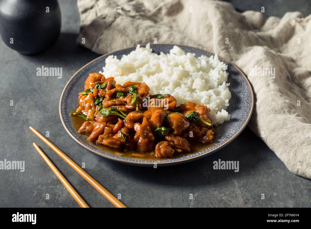Homemade Taiwanese Three Cup Chicken with Rice and Basil Stock Photo