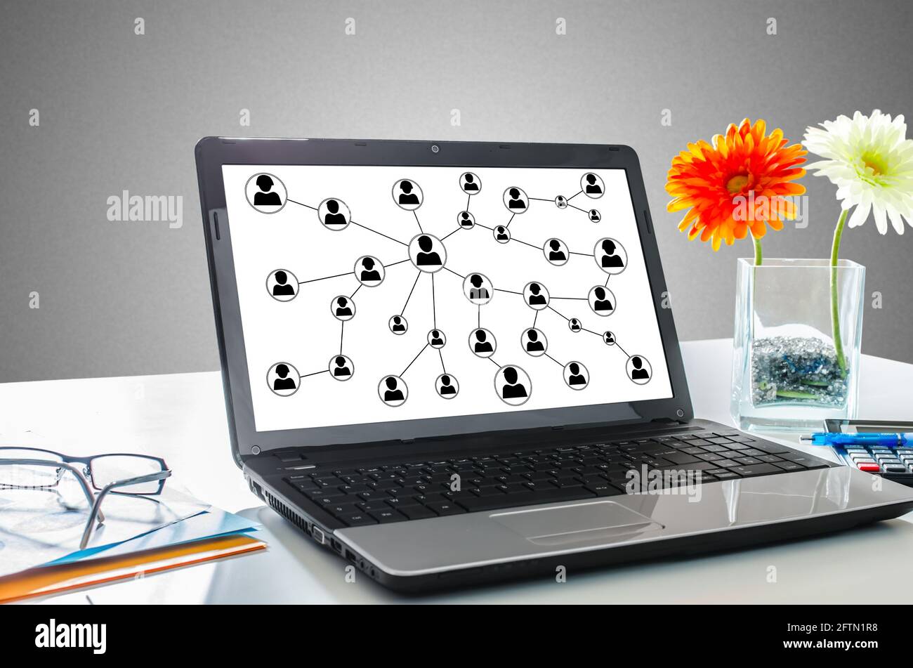 Laptop screen showing social network concept Stock Photo - Alamy