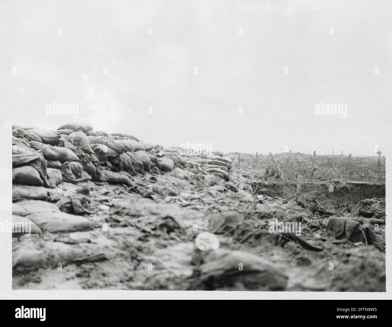 World War One, WWI, Western Front - A front line trench with sandbags, mud and barbed wire, France Stock Photo