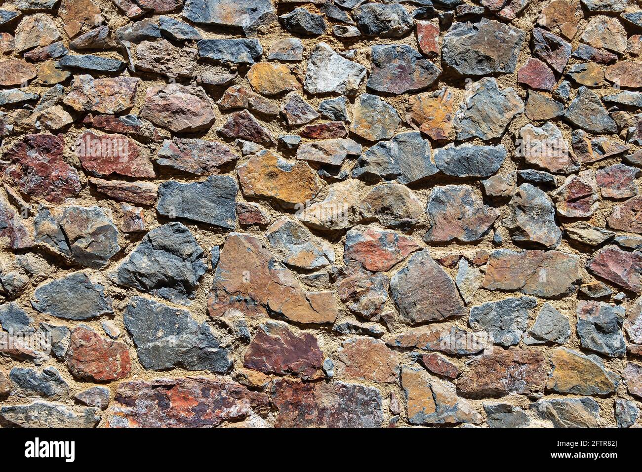 Rustic stone wall for texture Stock Photo