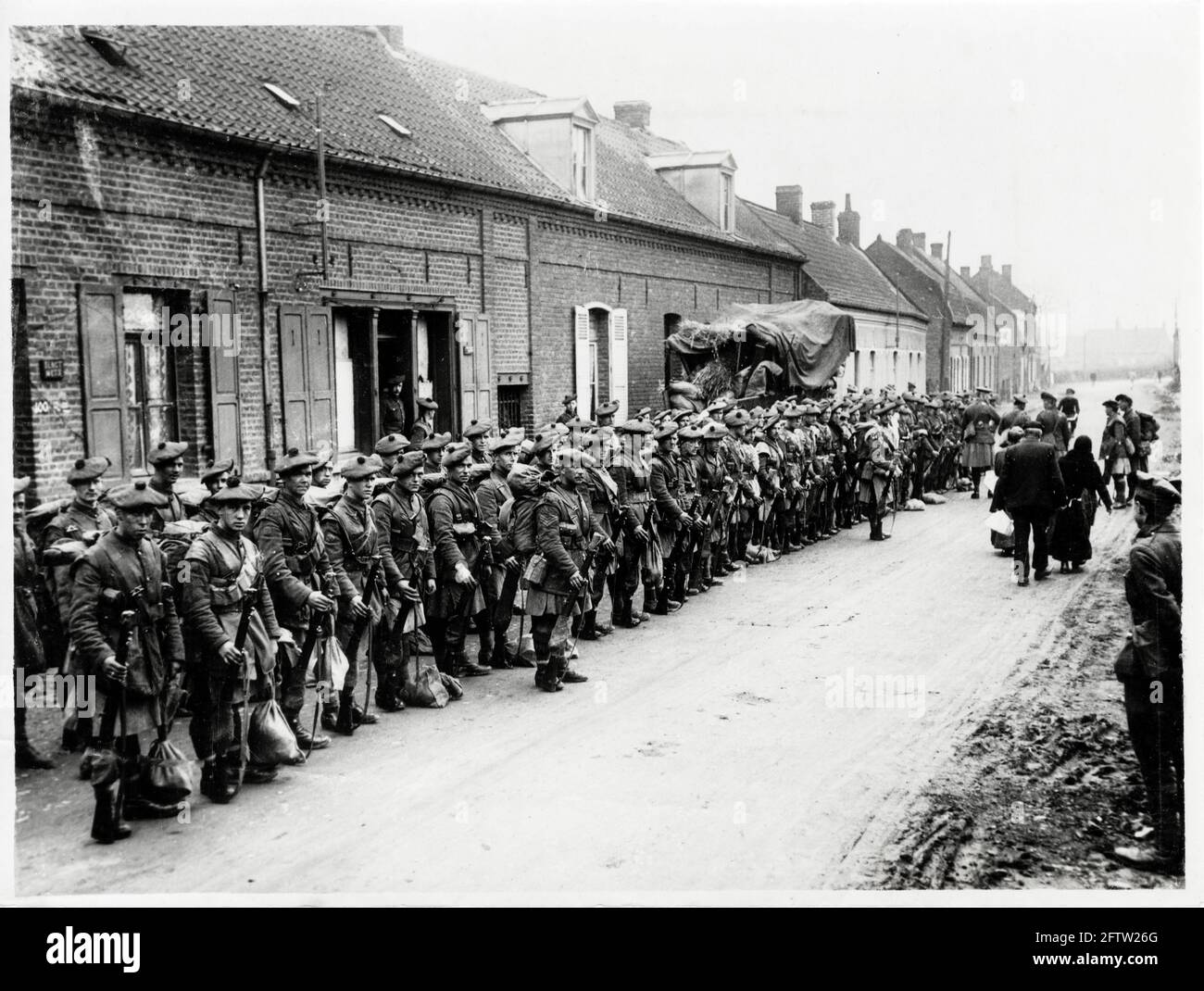 World War One, WWI, Western Front - Black Watch troops on parade in a village prior to moving up to the fighting, France Stock Photo