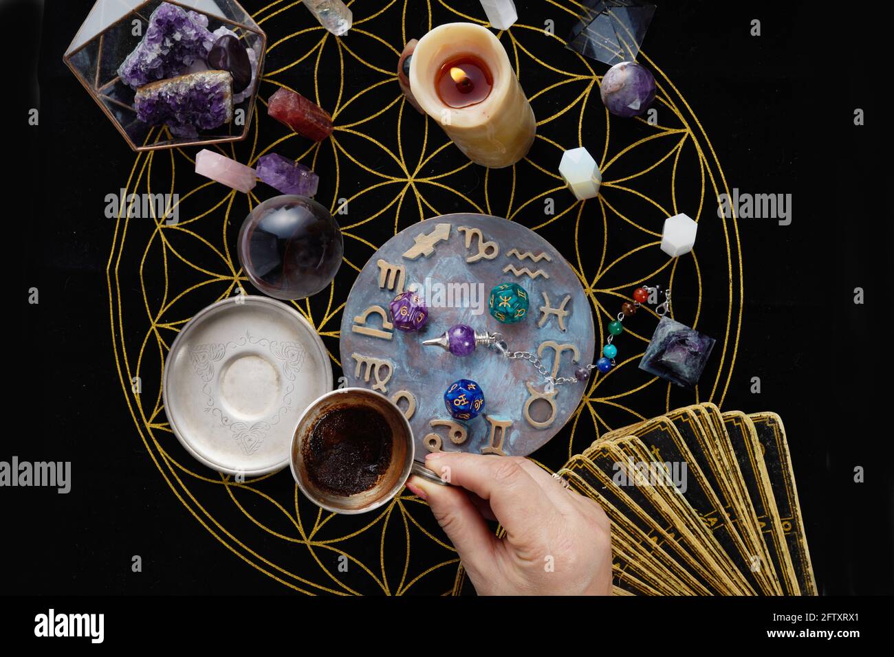 Fortune Telling Table with tarot cards and esoteric objects. Fortune